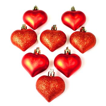 Little red xmas tree hearts on a white background