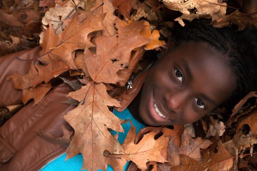 Happy  girl in the forest is having fun