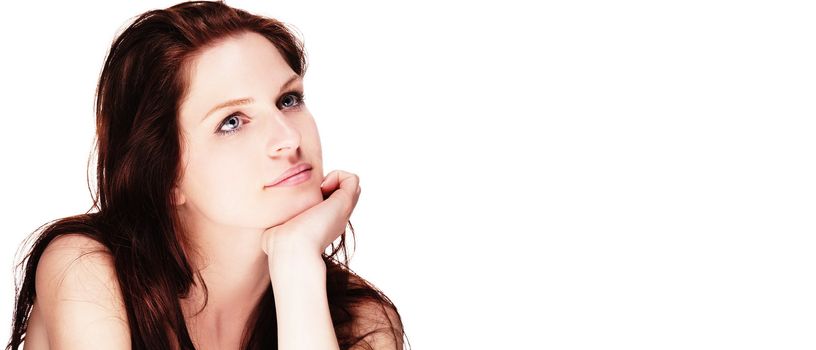 portrait of a beautiful dreaming woman on white background