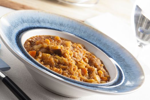 Fresh homemade quinoa stew with fresh vegetables.