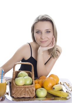 Young smiling woman with fruits. Over white background
