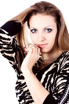 Ambition and greed in fashion woman with jewelry in hands on white background
