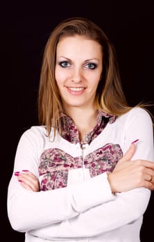 Portrait of sexy mysterious woman on black background
