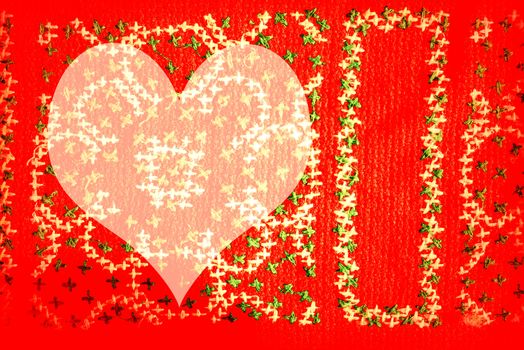 colorful background red heart with cross stitching