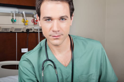 Portrait of male surgeon in hospital