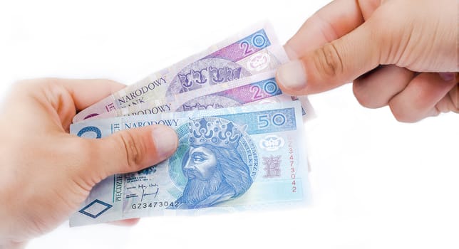 An image of polish zloty banknotes held in hand
