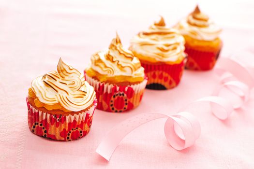 Cupcakes with whipped cream and icing
