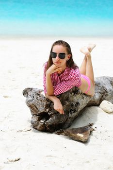 Woman in sunglasses at beach 