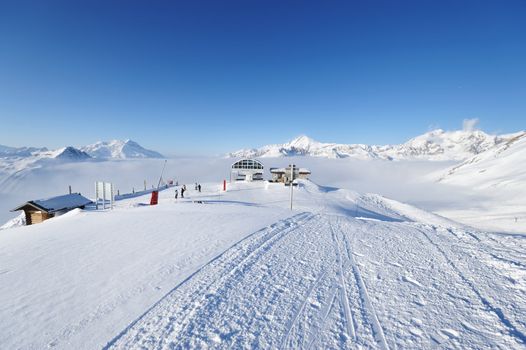 Ski lift station in mountains at winter, Val-d'Isere, Alps, France
