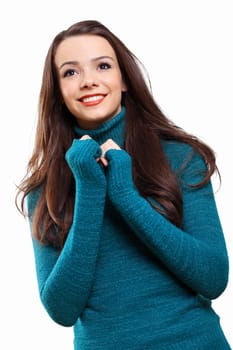 Young pretty woman with long hair wearing warm pullover