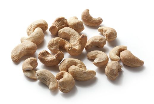 Isolated handful of cashew nuts on the white background