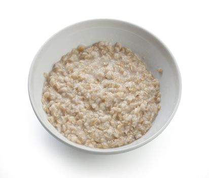 Isolated white bowl with fresh porridge on the white