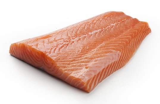Chunk of raw salmon on the white background
