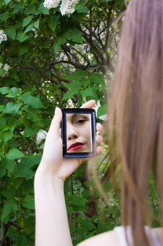 reflection of a girl in the mirror