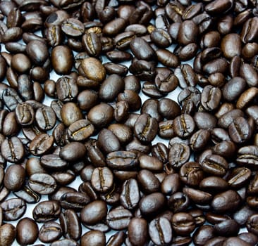 Black coffee beans, close-up of coffee beans for background and texture