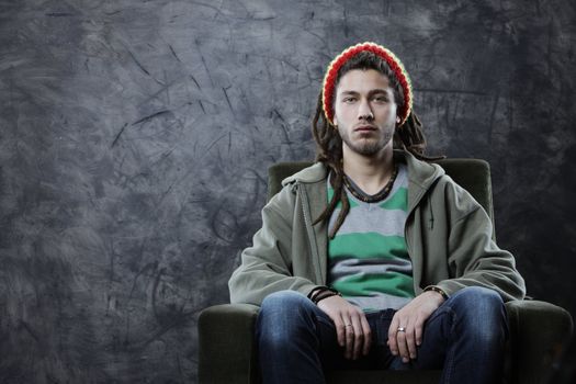 Portrait of Young cool man with dreadlocks 
