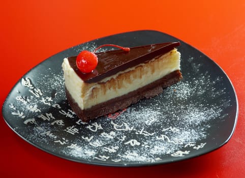 Chinese Style .cheesecake with chocolate .closeup