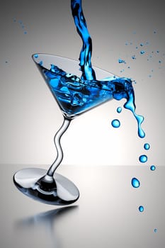 An image of a nice blue cocktail glass splash