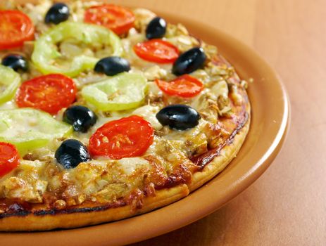 .home pizza with tomato and eggplant  Closeup 