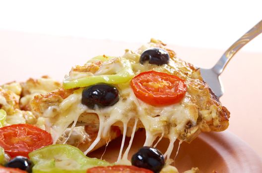 .home pizza with tomato and eggplant  Closeup .taking slice of pizza,melted cheese dripping. isolated on white background.
