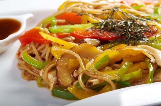 Japanese cuisine .noodles udon with chicken and vegetables