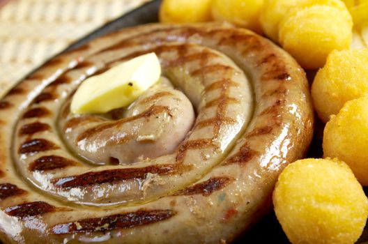 Japanese cuisine .Sausage making roasted with vegetable