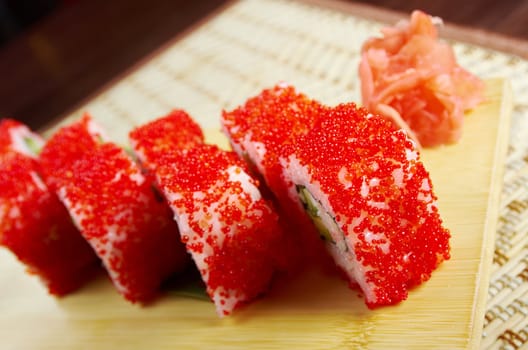 Japanese sushi  traditional japanese food.Roll made of Smoked fish and red roe