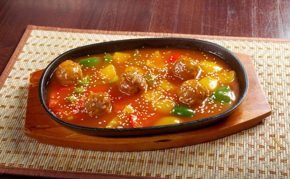 chinese cuisine .pork with tart sweet sauce,pineapple and pepper