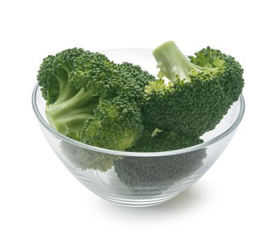 Some pieces of broccoli in the glass bowl
