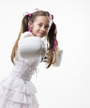 young fighter girl wearing boxing gloves