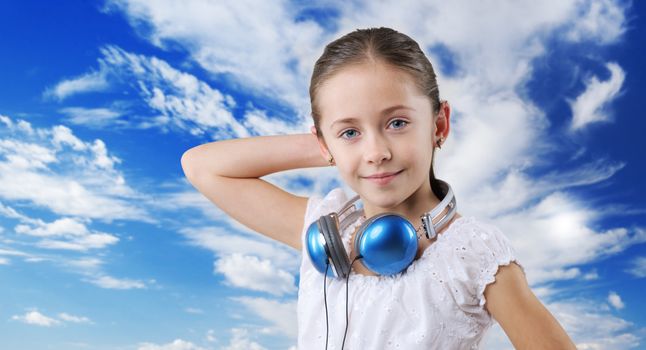 little pretty child with headphones