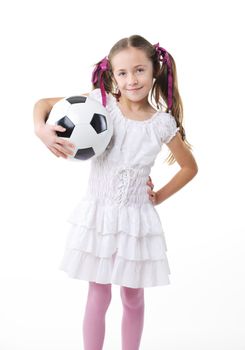 Cute little girl with soccer ball on white background