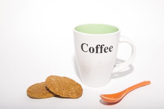 one cup and two cookies