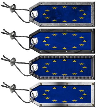 Four grunge metallic tags with European Union flags, steel cable and metal rivets
