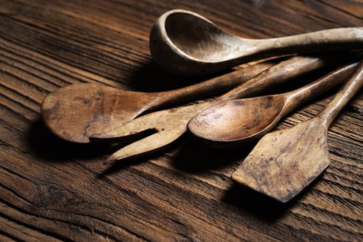wooden kitchen accessories on wood background