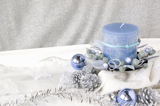 blue candle on christmas decoration background