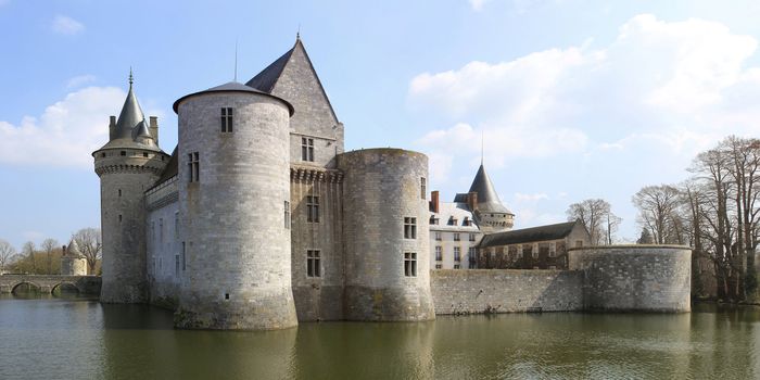 a medieval castle with its moats, towers and dungeon