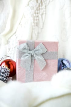 close up pink gift box with ornament