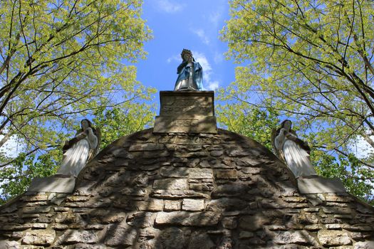 virgin with angels in a church statues of fishermen from the Basque country in France