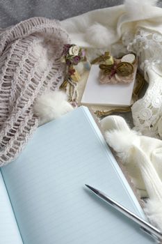 note book blank page is open with pen in winter morning