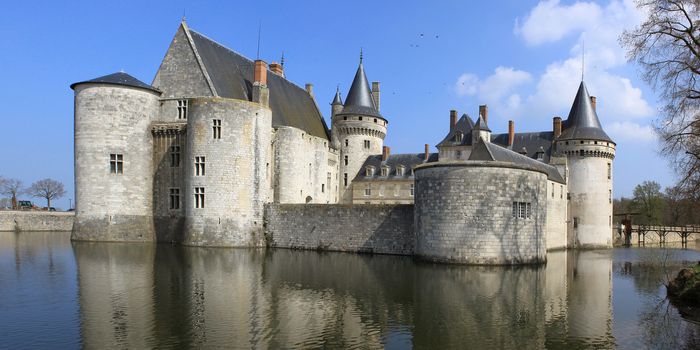 a medieval castle with its moats, towers and dungeon