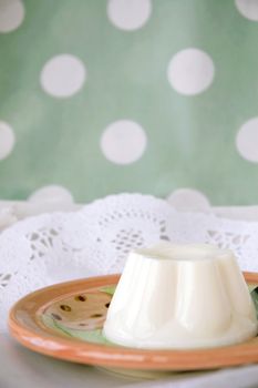 pudding on plate with sweet polka dots