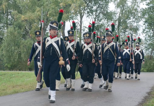 Historical reconstruction.  Soldiers of 9 Light Infantry regiment of Napoleon army at the festival of the Borodino battle