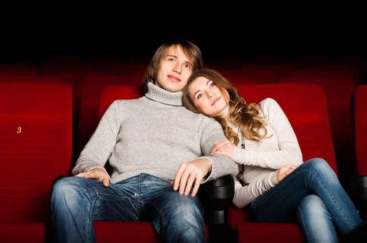 young couple in the cinema to enjoy the movie