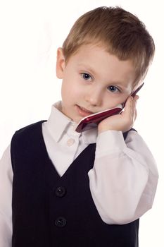 Little man discussing important business on the cell phone. Shot in studio over white.
