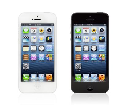 Kiev, Ukraine - January 9, 2013: The two new black and white Apple iPhone 5, sixth generation version of the iPhone is slimmer and lighter model with new high-resolution, 4-inch screen display.