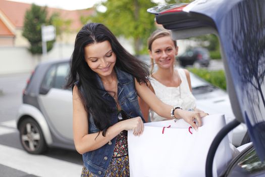 Two woman after shopping