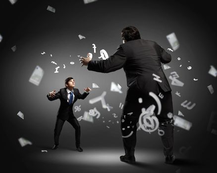 Image of businesspeople arguing and acting as sumo fighters against city background