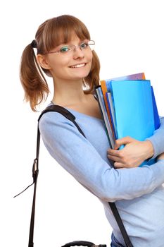 Happy smiling student standing and holding books