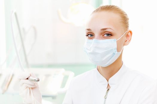 A portrait of a dental worker, dentist or assistant